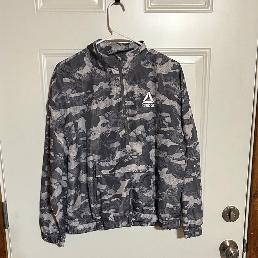 Reebok women’s Black and Gray Camo half zip jacket